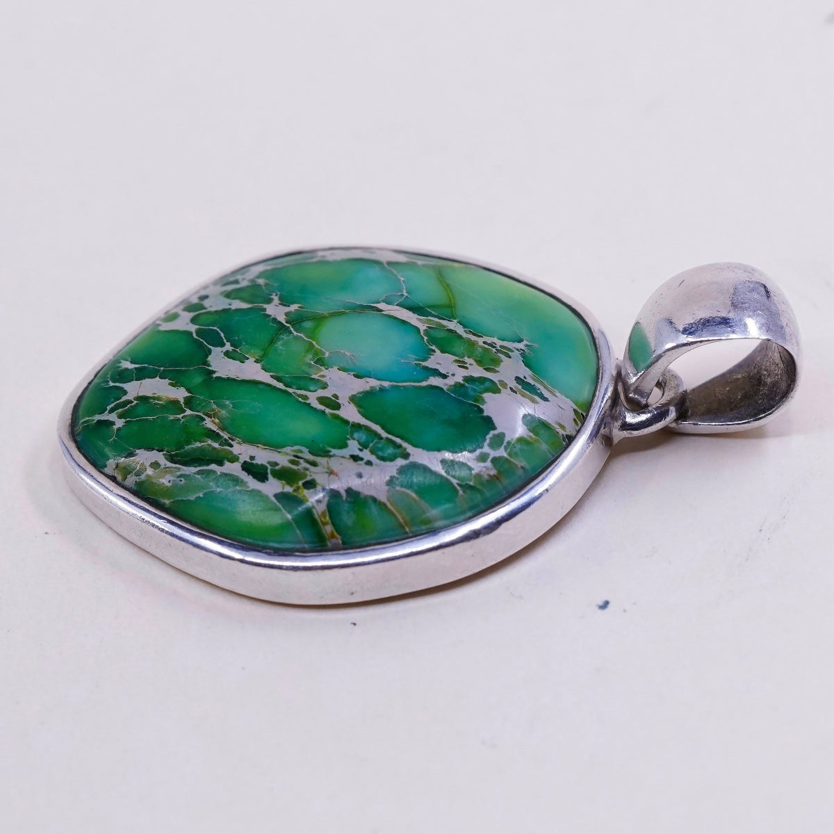 Sterling silver handmade pendant, Mexican 925 w/ Carioca lake turquoise