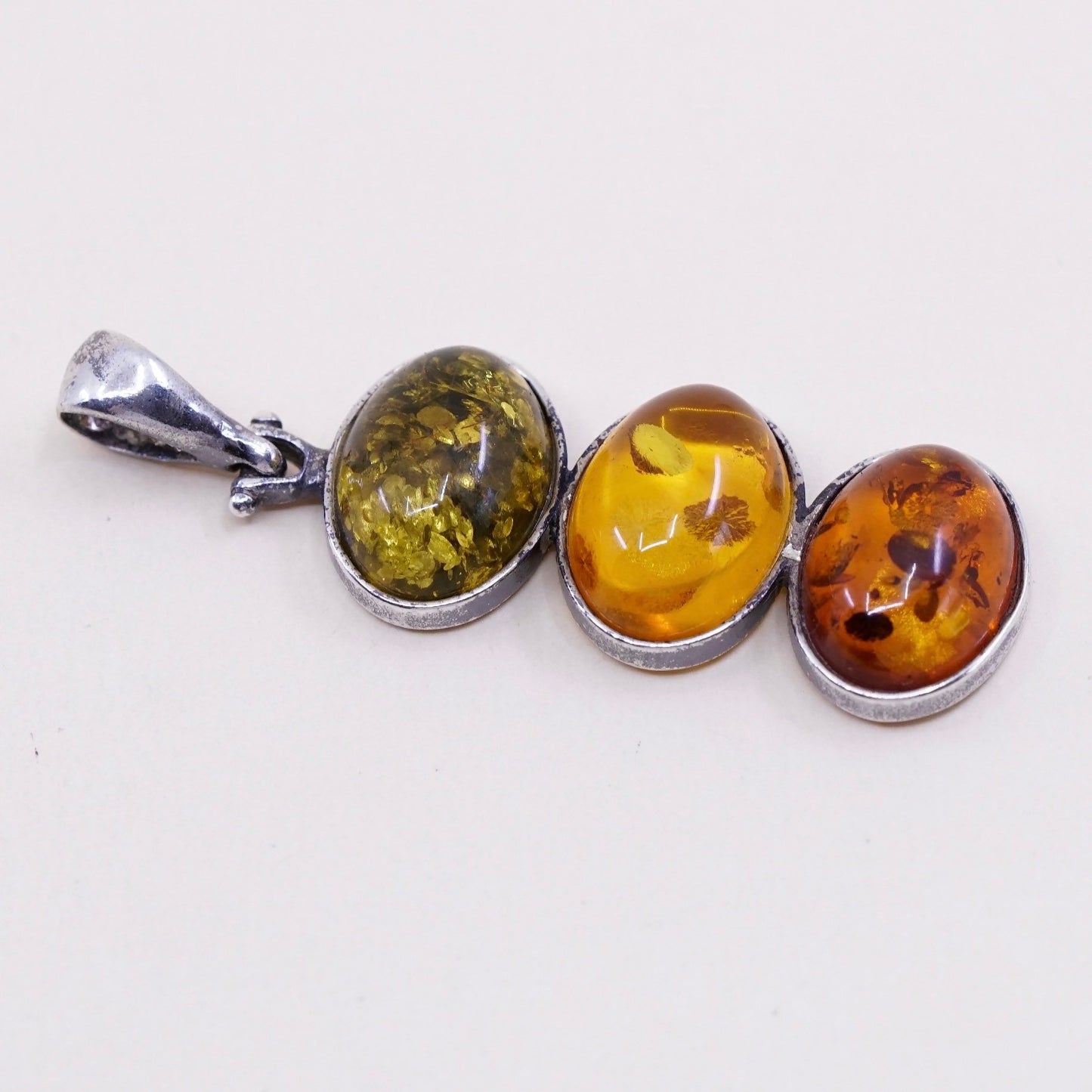 Vintage sterling 925 silver handmade pendant with oval amber