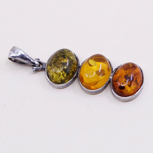 Vintage sterling 925 silver handmade pendant with oval amber