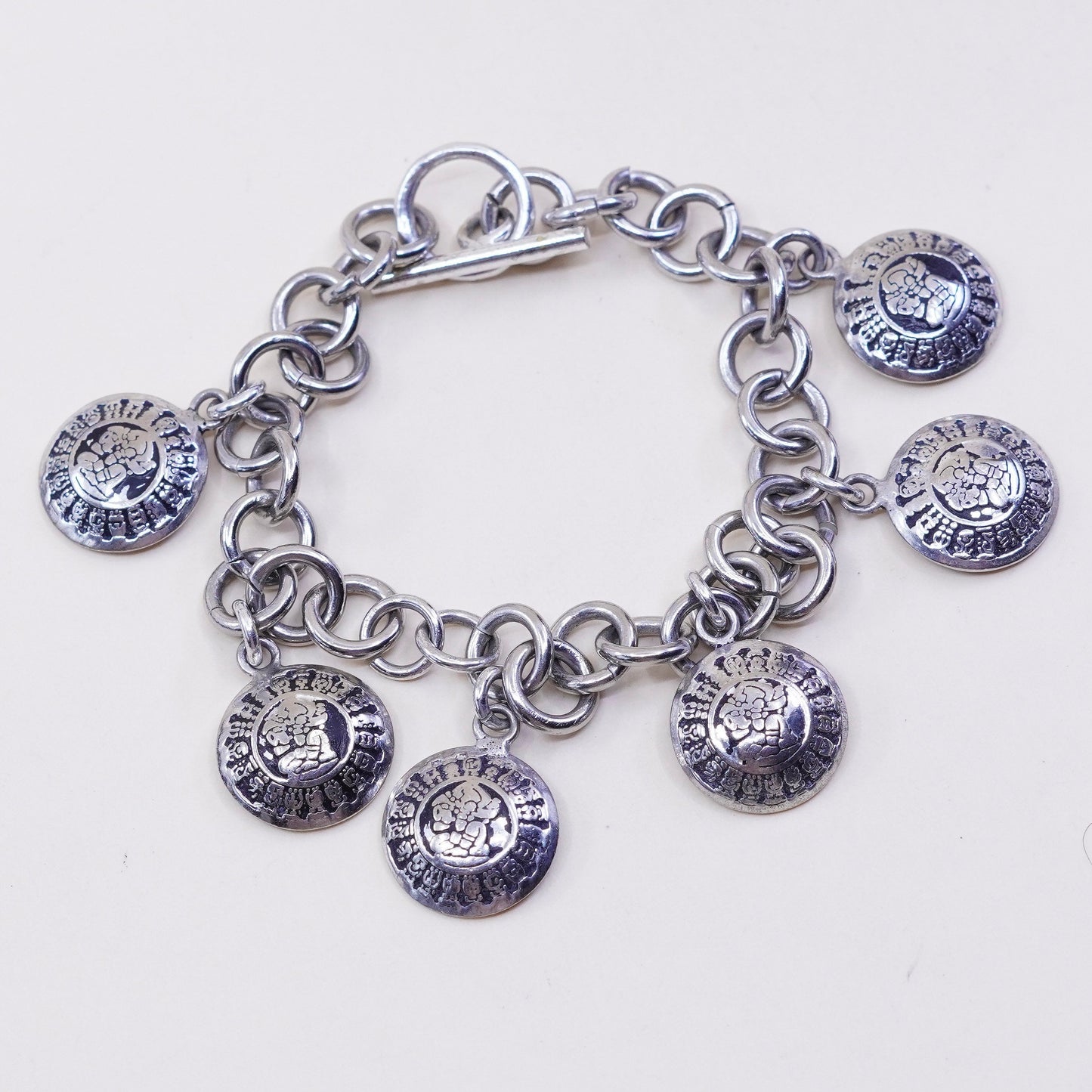 6.25”, sterling silver handmade bracelet, 925 chain w/ Mayan calendar charms