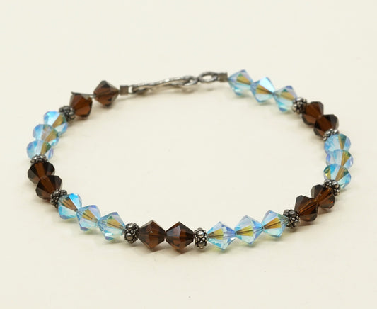 7.5”, VTG Sterling silver handmade bracelet w/ brown N blue Swarovski crystal