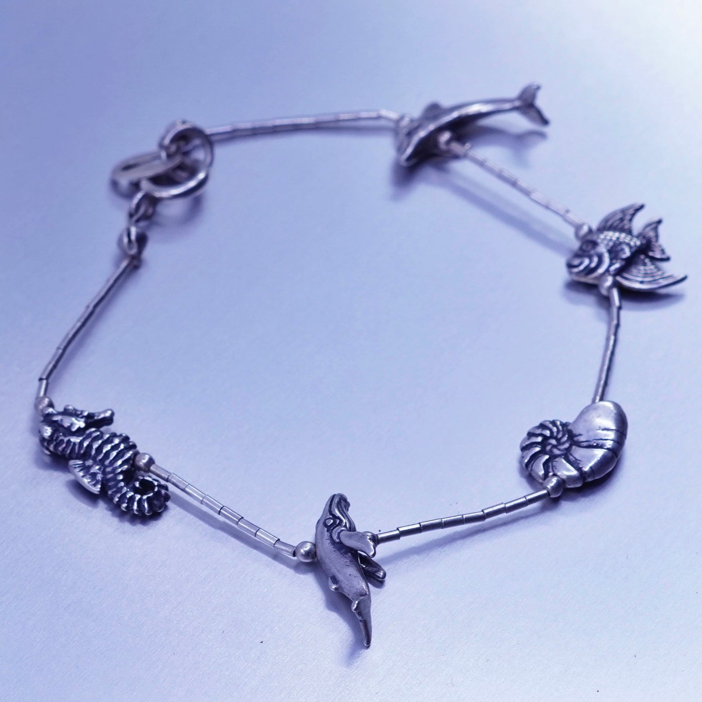 7.25”, Sterling 925 silver bracelet, liquid chain seahorse whale dolphin charm