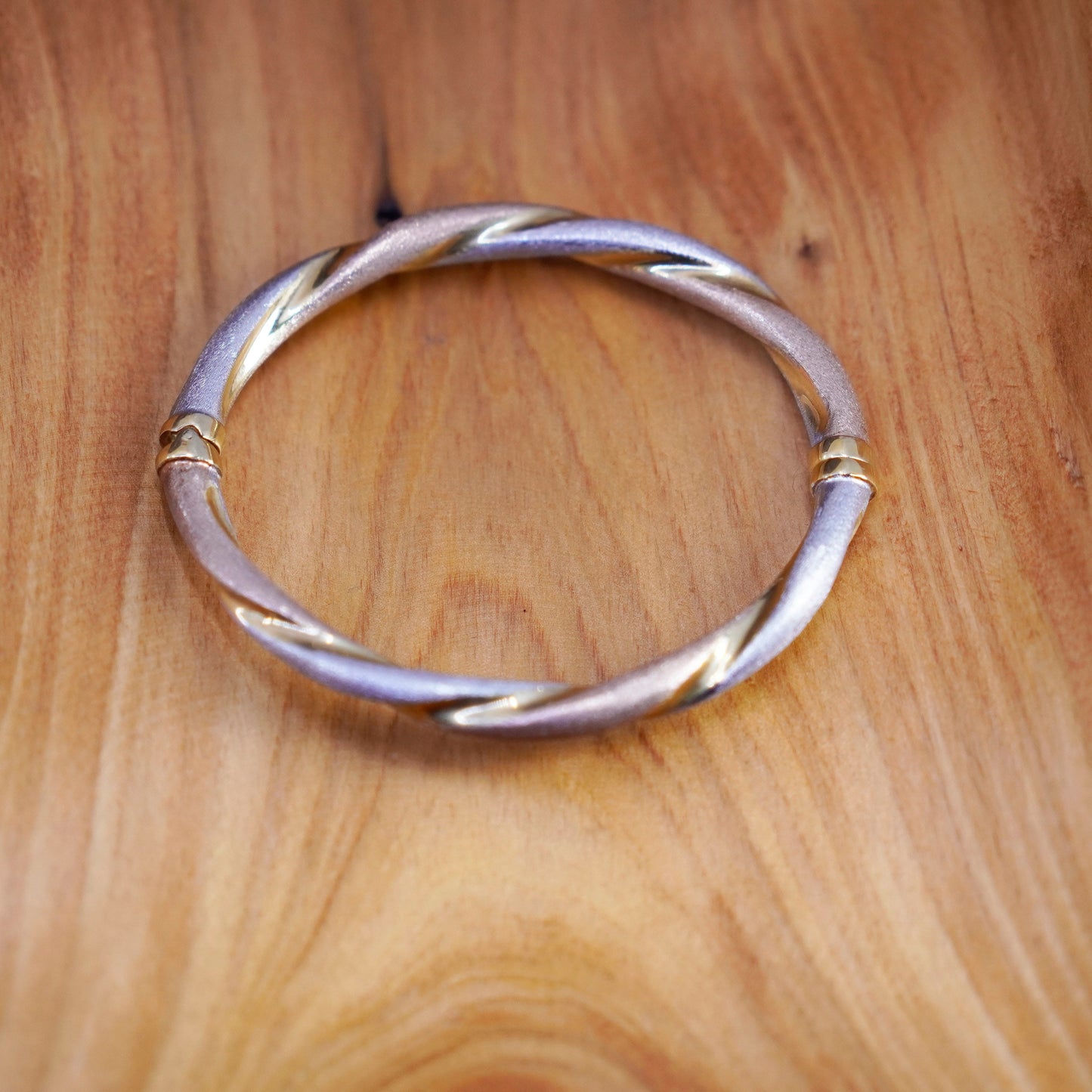 7.25”, triple tone gold over Sterling silver bracelet, matte 925 twisted bangle