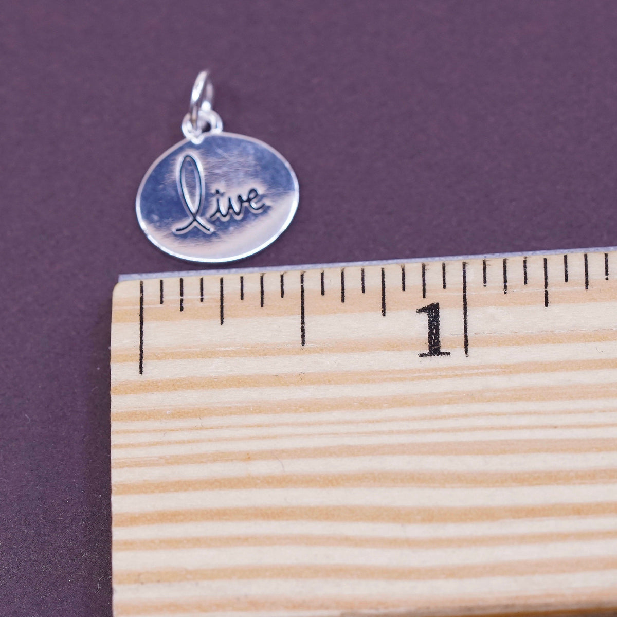 vtg Sterling silver handmade charm, 925 tag pendant embossed “live”