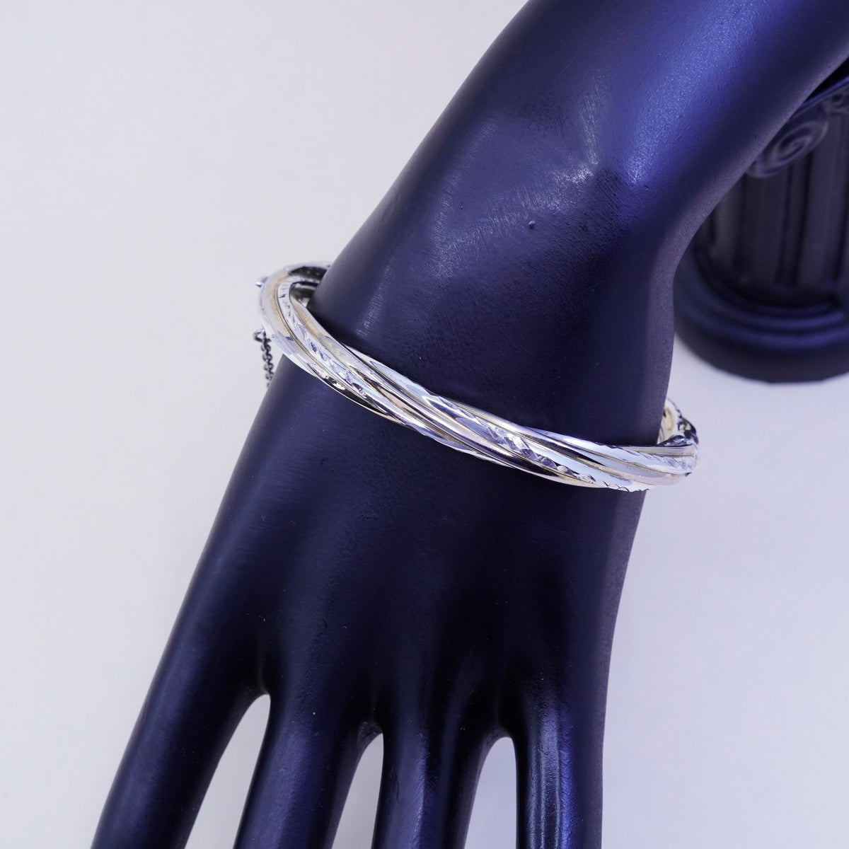 7.25”, two tone sterling silver bracelet, 925 hinged diamond twisted bangle