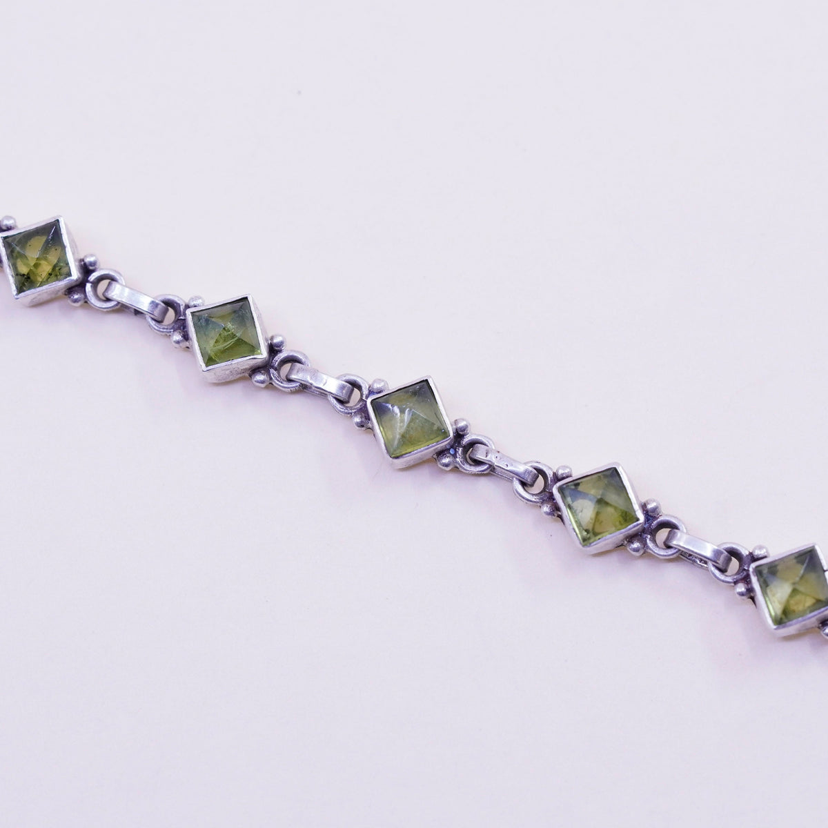 7.25”, Vintage Sterling 925 silver handmade bracelet with diamond cut peridot