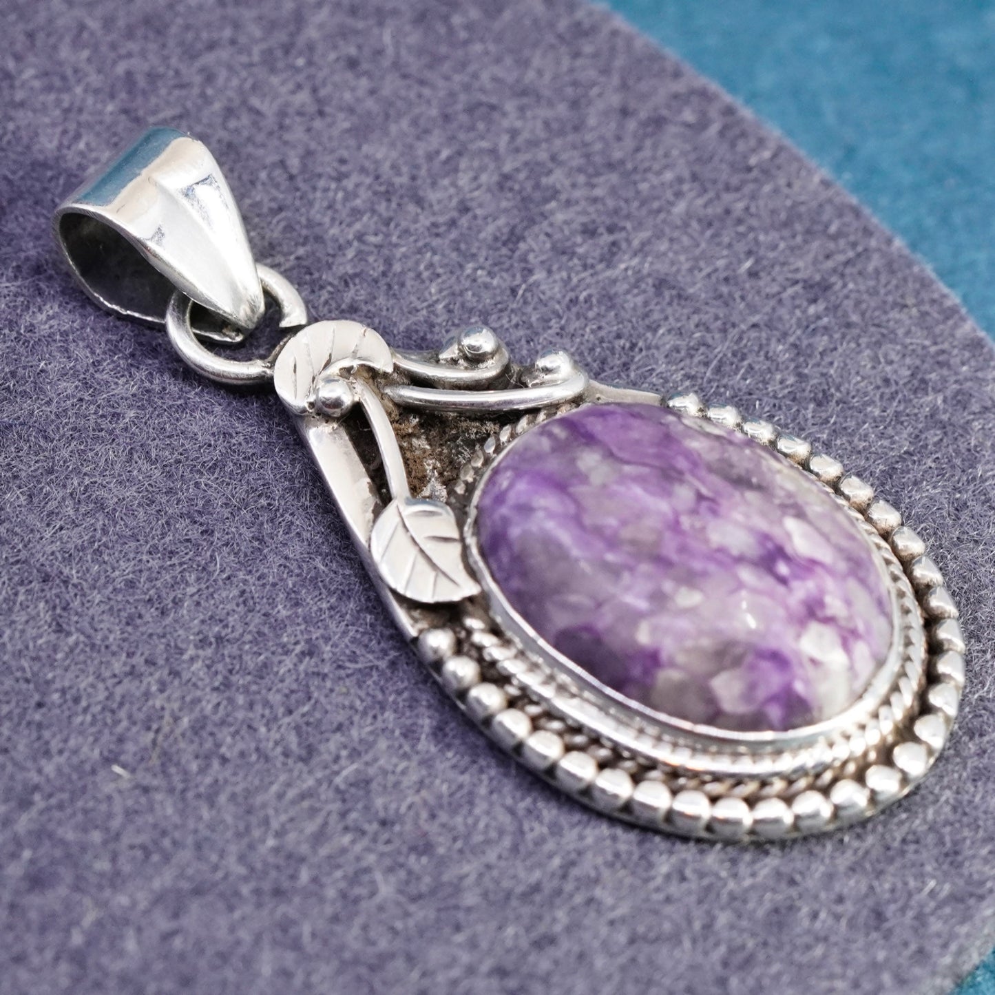 Vintage sterling 925 silver handmade pendant with oval amethyst and leaves
