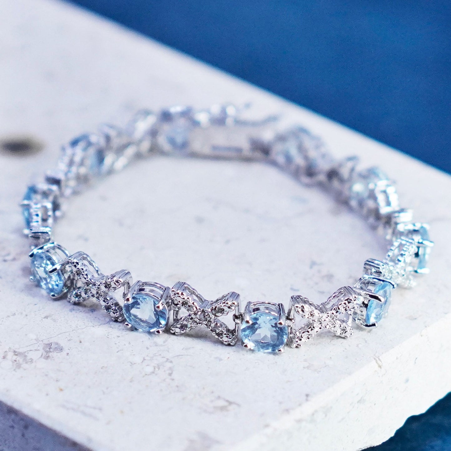7”, vintage Sterling 925 silver tennis bracelet with topaz and diamonds