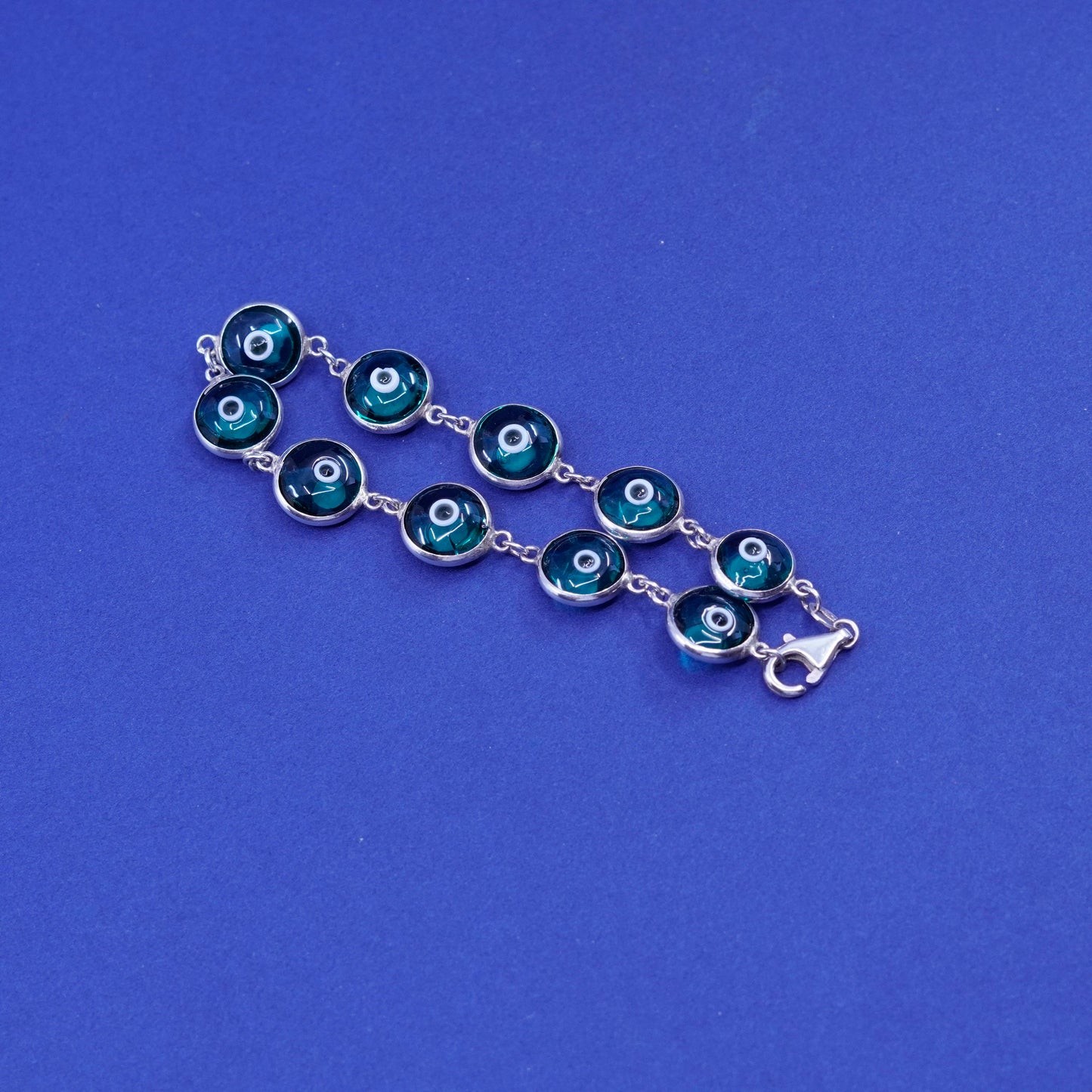 6.75”, Vintage handmade sterling 925 silver bracelet, blue glass evil eye beads