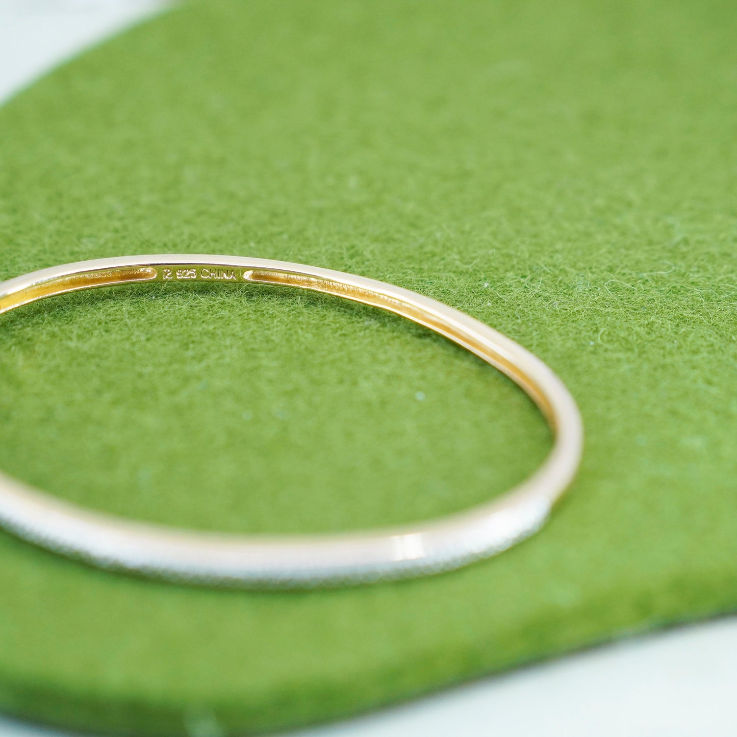 6.5”, vermeil gold over Sterling silver hinged bangle bracelet with diamond