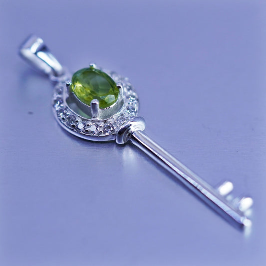 Vintage sterling 925 silver key pendant with peridot and cz