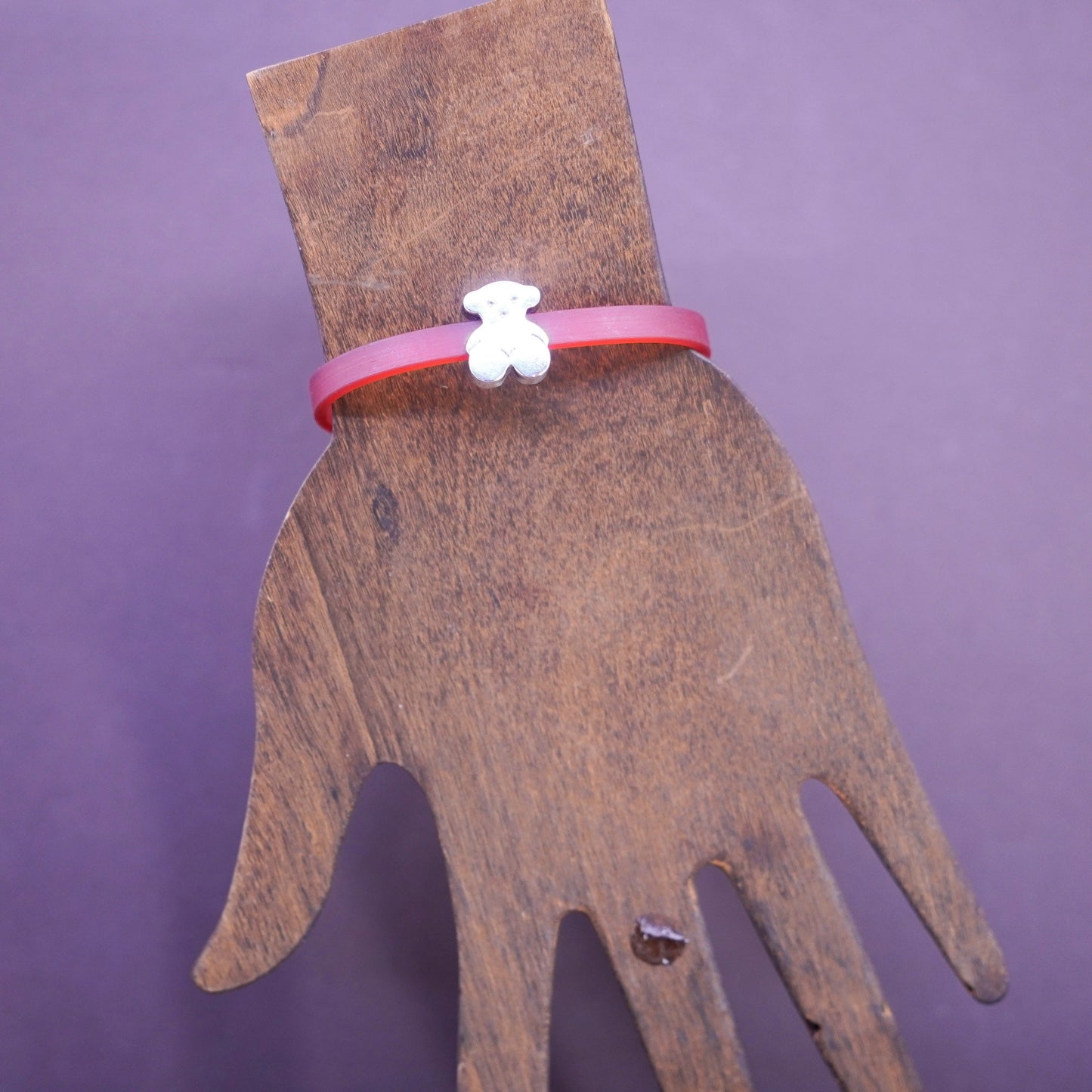 6.5”, vintage AG red rubber bracelet with sterling 925 silver teddy bear charm