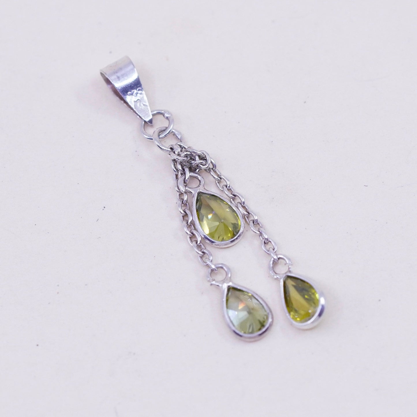 Vintage handmade Sterling 925 silver angel pendant with teardrop peridot