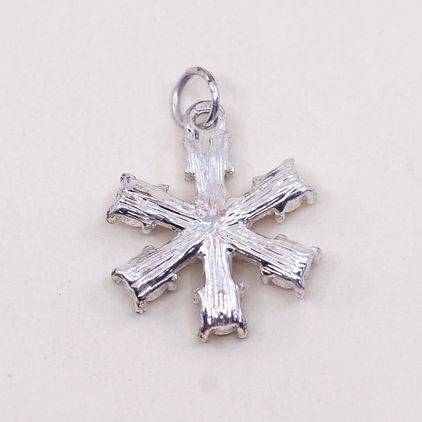 Vintage silver tone snowflake pendant charm with Cz
