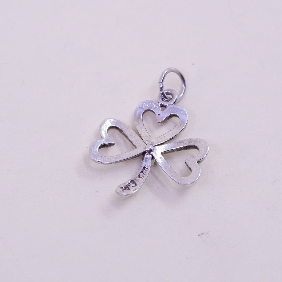 Vintage sterling silver handmade pendant, textured 925 clover with emerald