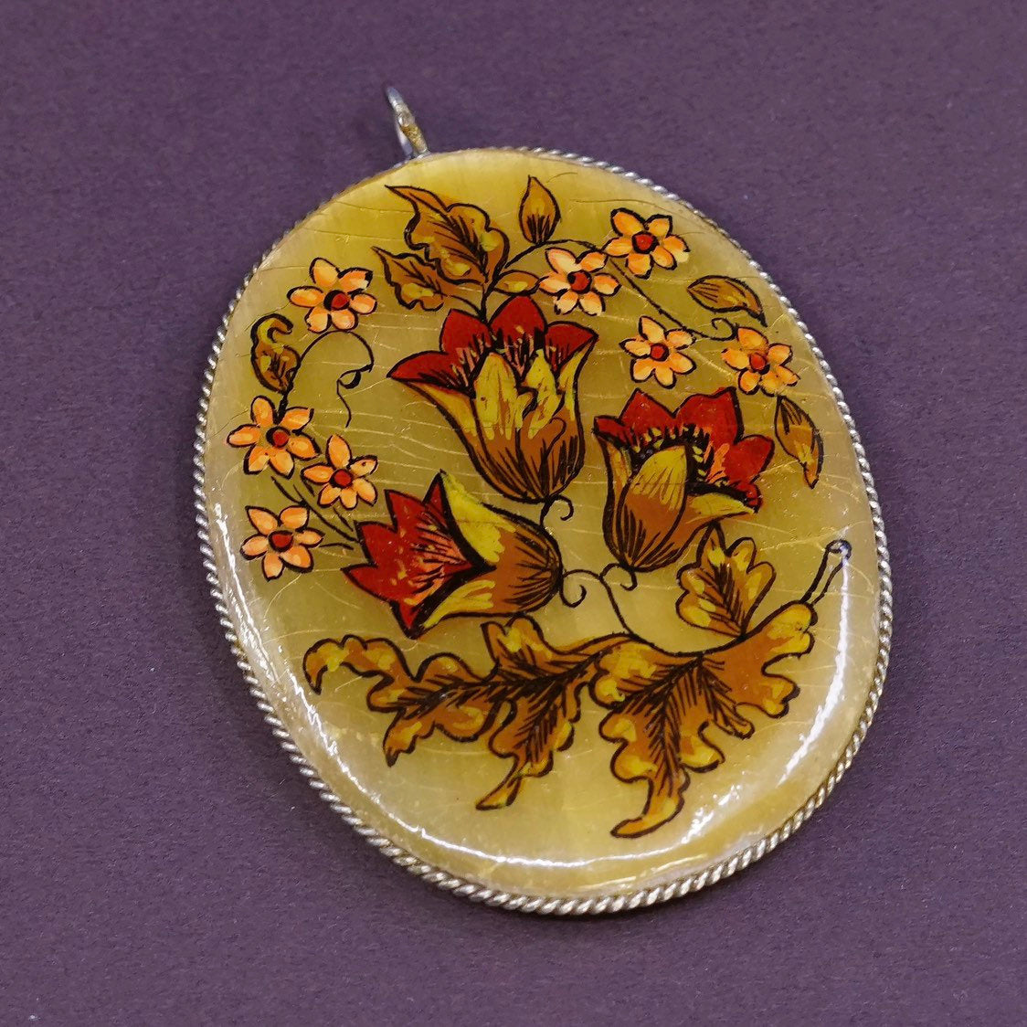 VTG silver tone wire with golden stone and flower details