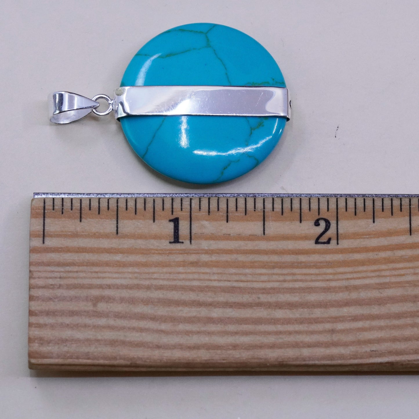 Vintage Sterling silver handmade pendant with circle turquoise