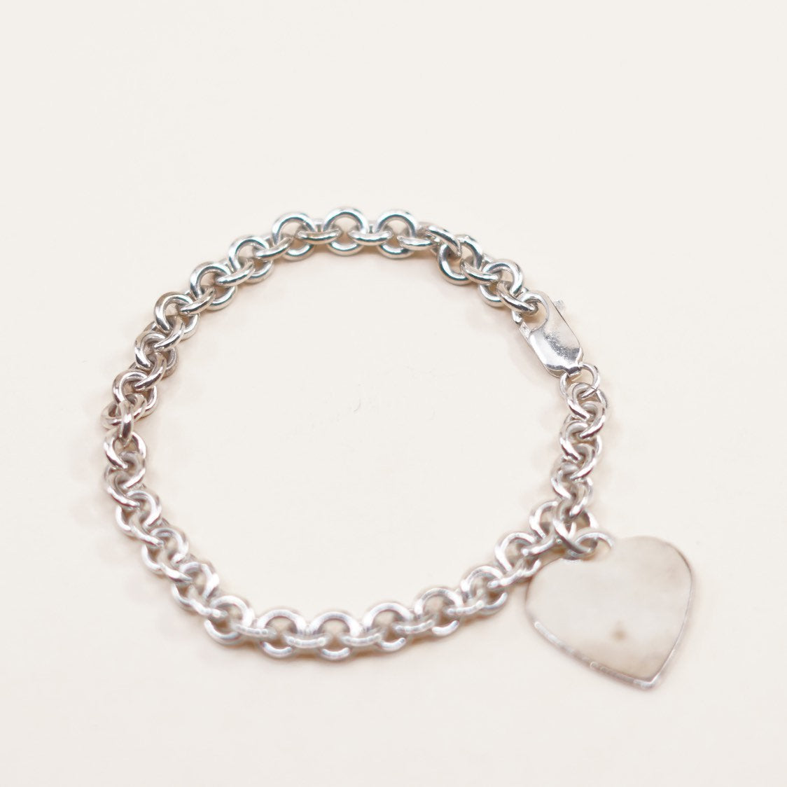 7.25”, VTG sterling silver circle link bracelet, circle chain w/ heart charm