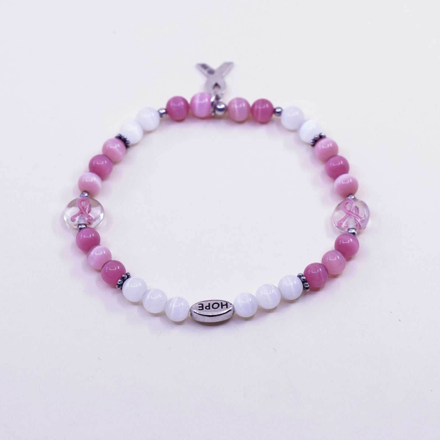 7.5”, “Hope” bracelet, pink cats eye beads elastic band 925 ribbon bow tie