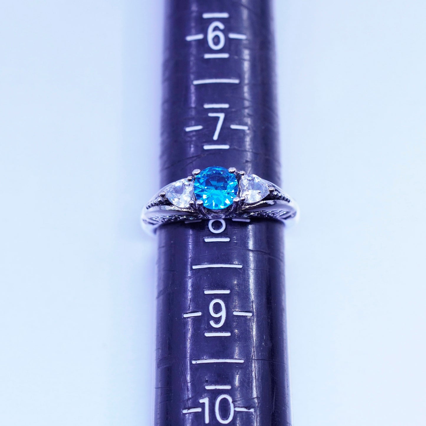 Size 7.75, vintage Sterling 925 silver handmade filigree ring with blue Cz
