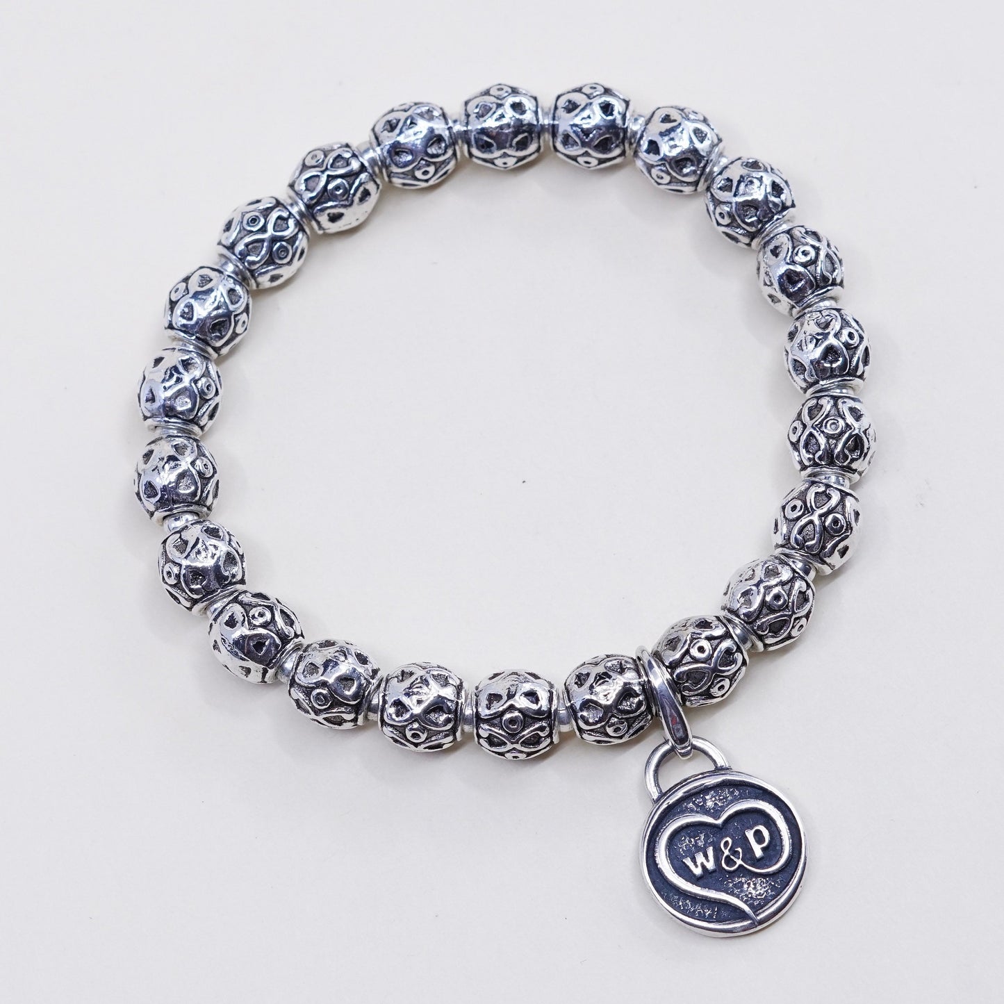 6.75”, sterling 925 silver handmade elastic bracelet textured beads N ASU charm