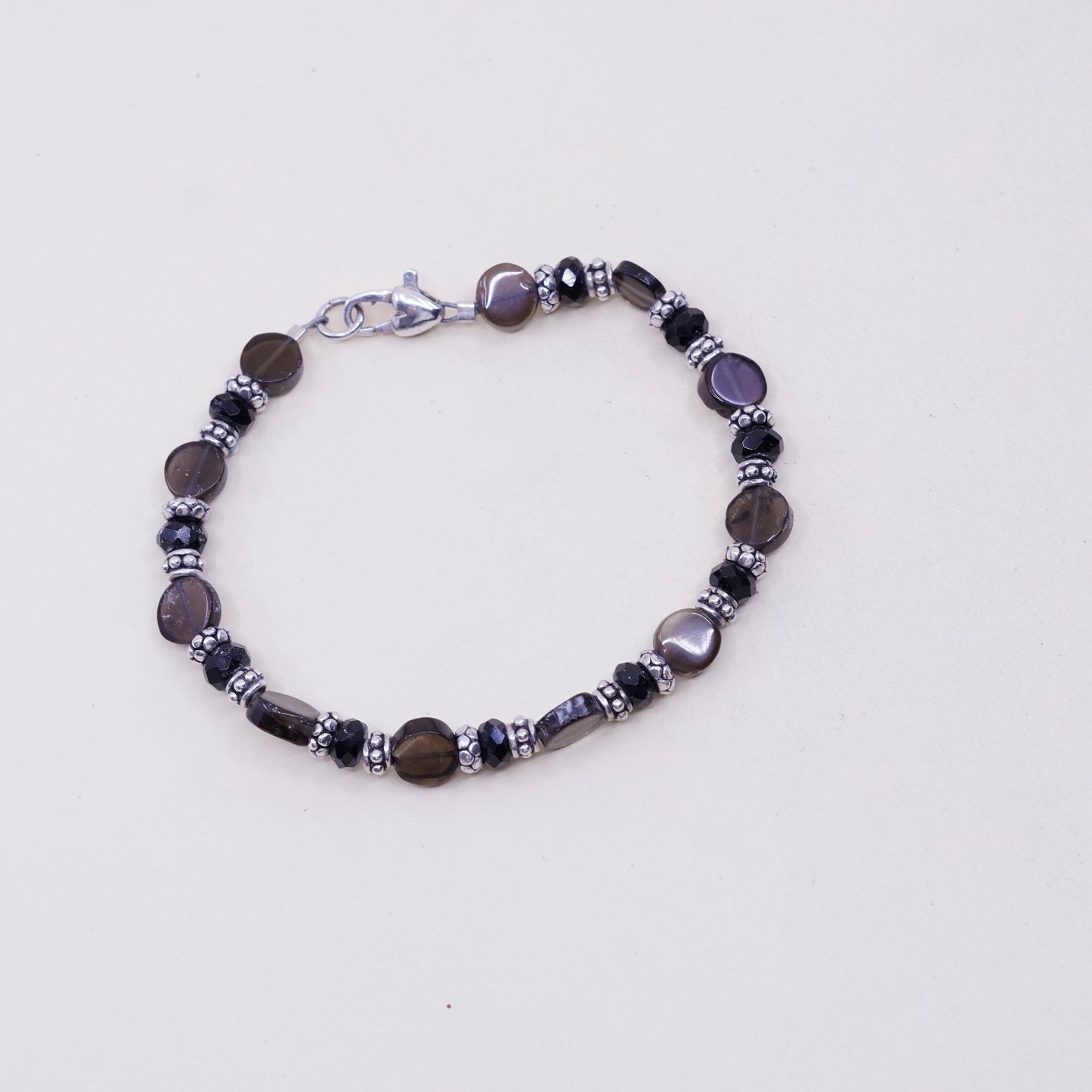 7”, sterling silver handmade bracelet, 925 beads w/ smoky crystal N heart clasp