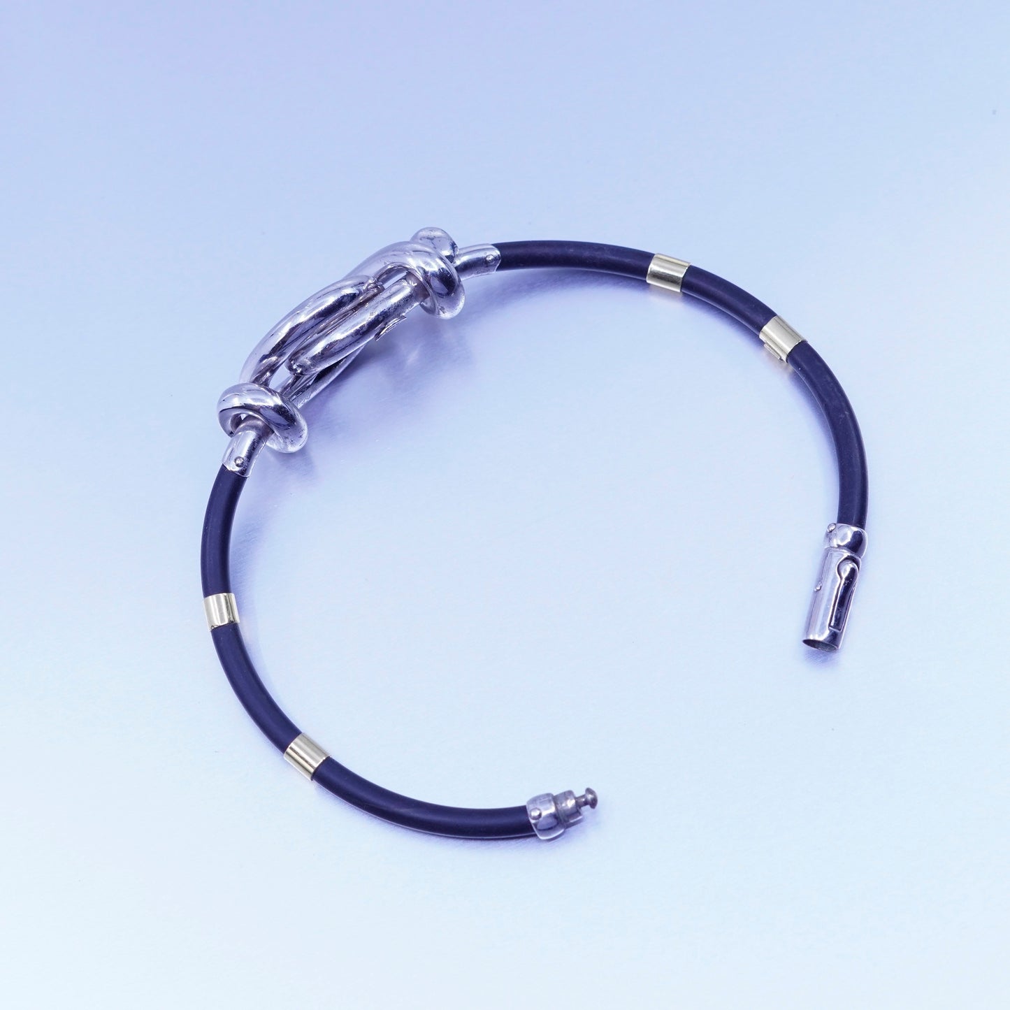 6.75”, sterling 925 silver knot bracelet with 14K gold tube black rubber chain