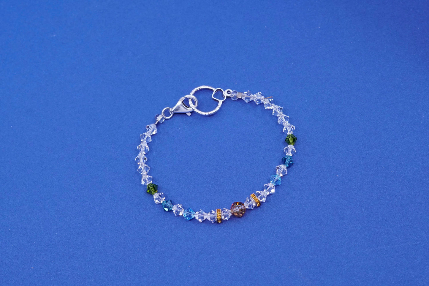 6.75”, Sterling 925 silver handmade bracelet with colorful Swarovski crystal