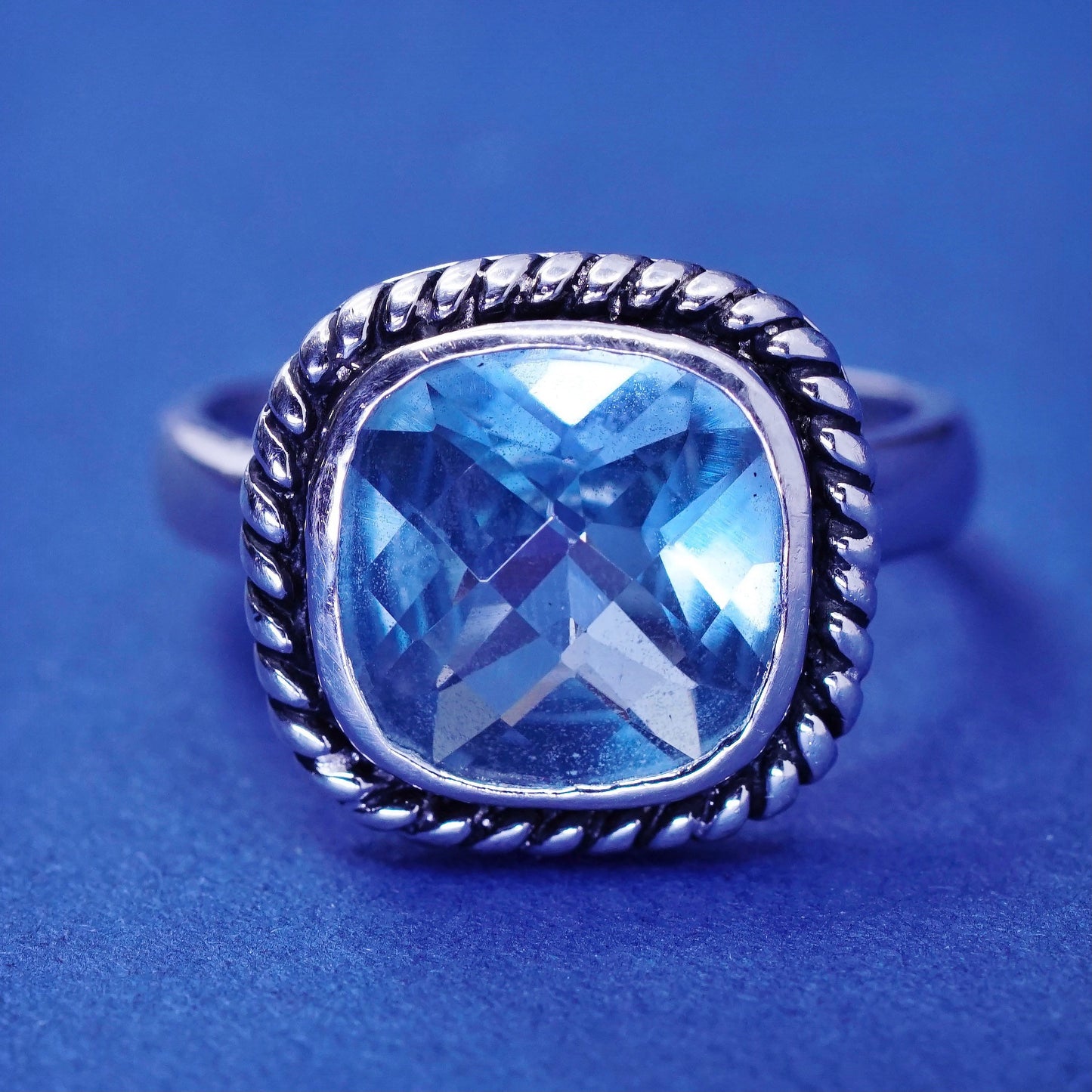 Size 7.75, vintage sterling 925 silver handmade ring with blue topaz and cable