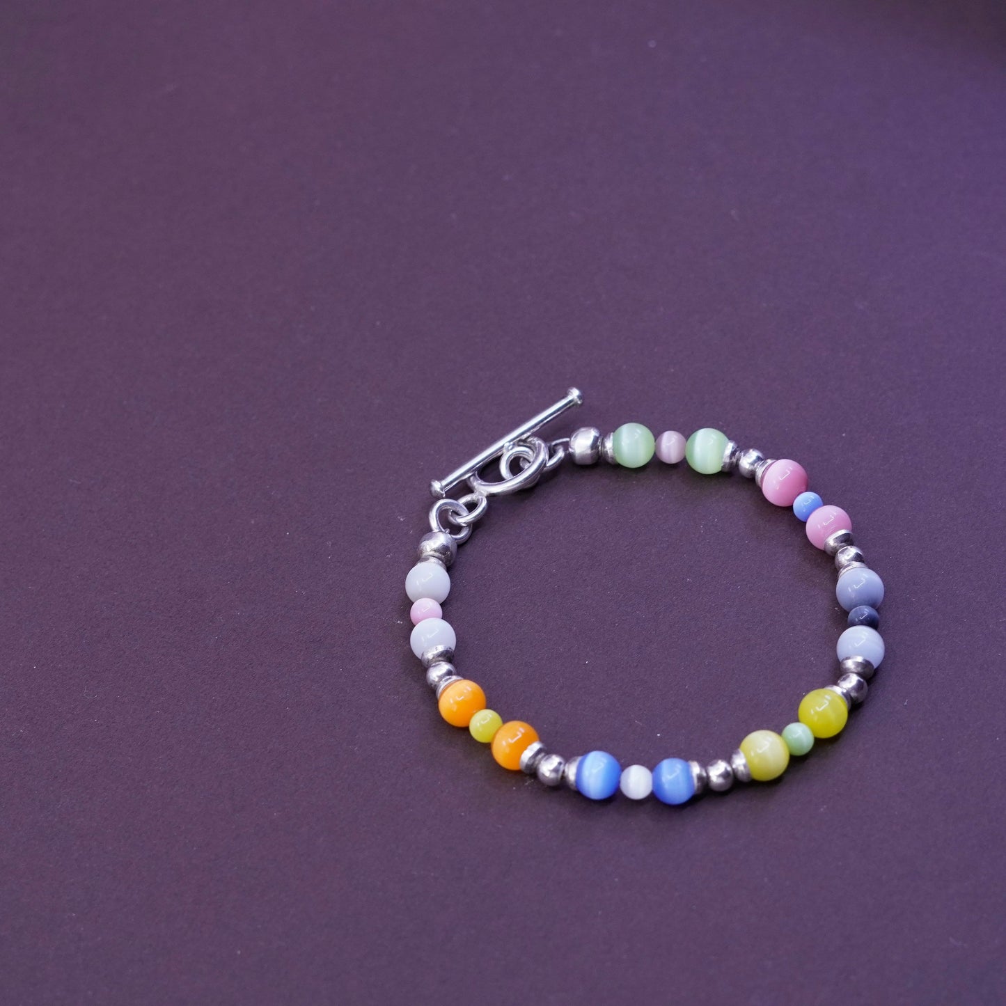 6.75”, Sterling 925 silver handmade bracelet, with colorful cat eyes beads