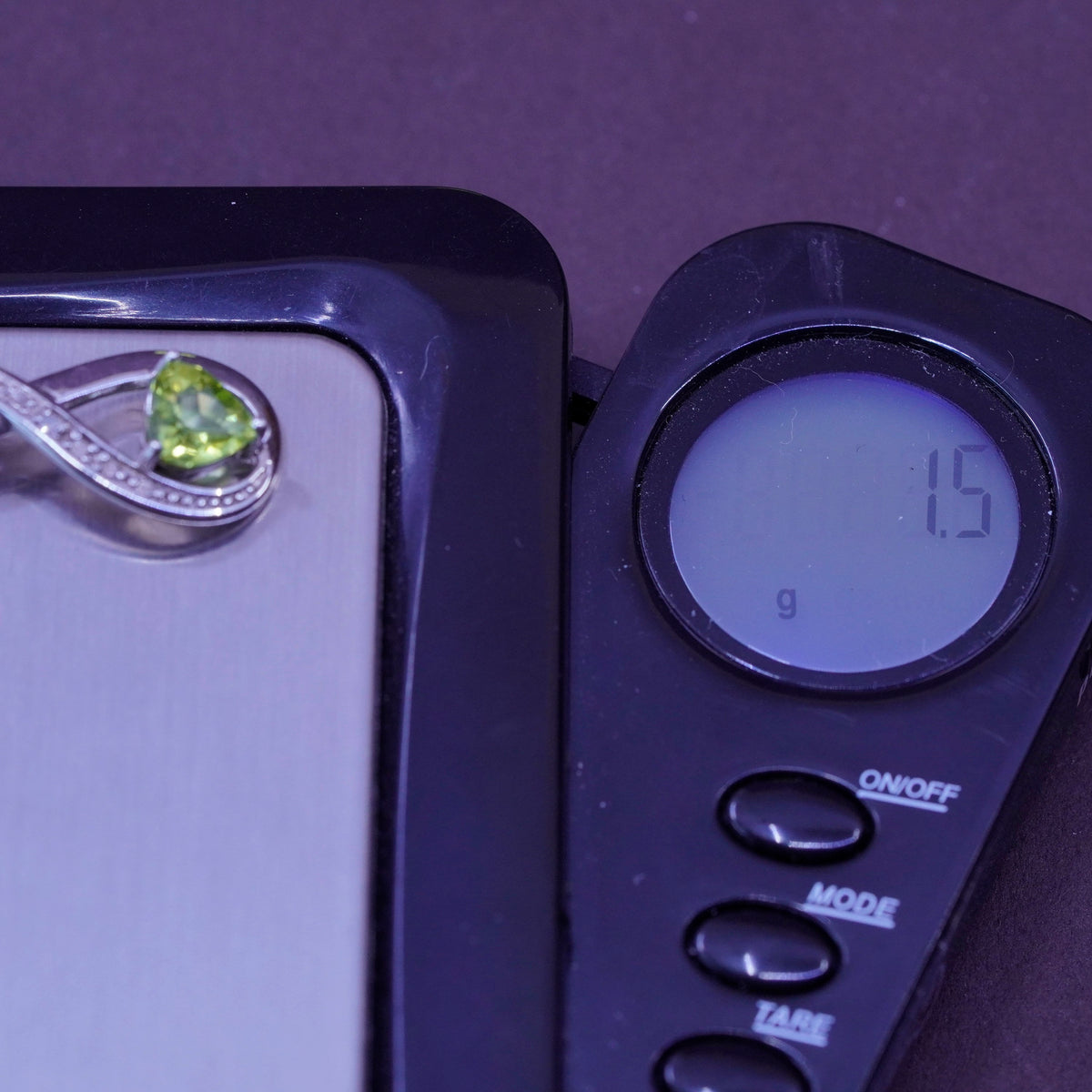 Vintage sterling silver pendant, 925 twisted loop with genuine diamond peridot