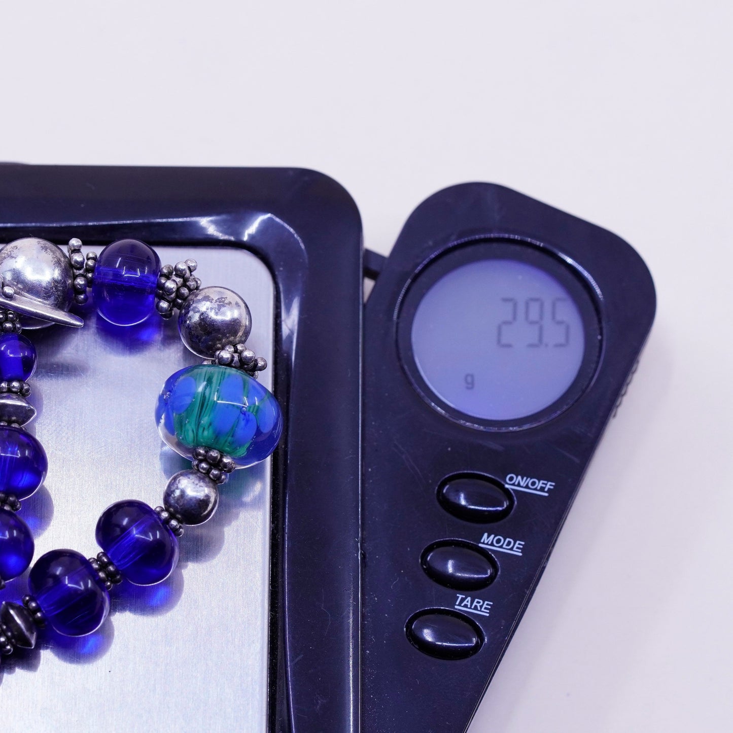 7.75”, vintage 925 Sterling silver bracelet with artisan blue glass beads