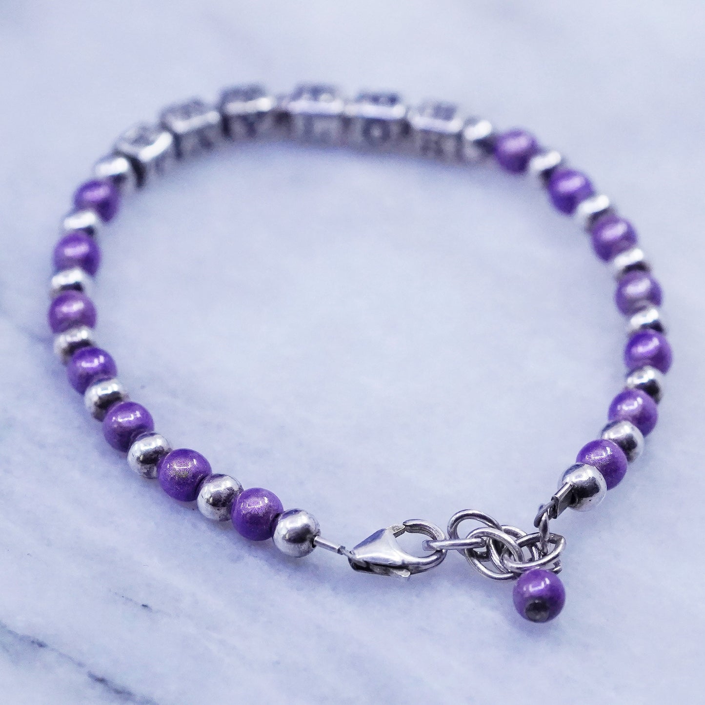 6.5”, Sterling silver handmade name “Taylor” cube bracelet purple crystal beads