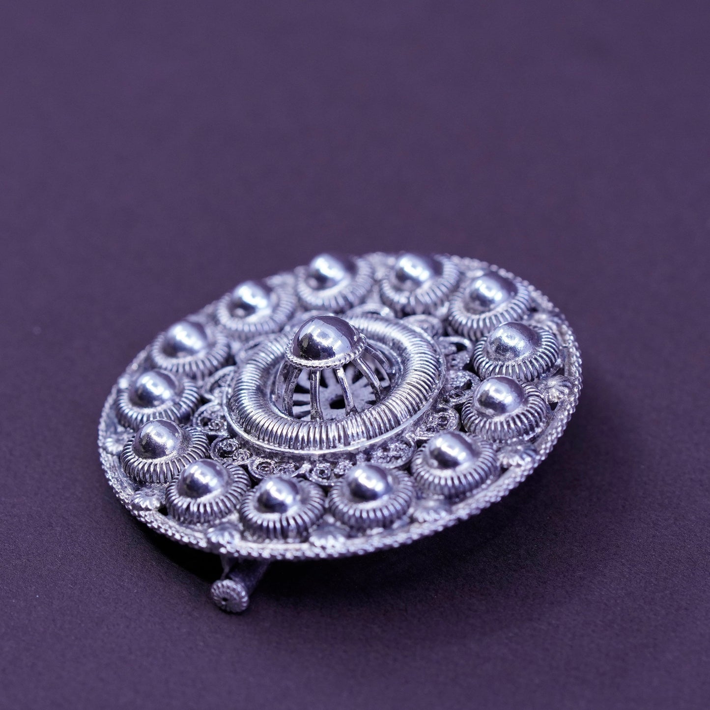 Vintage handmade sterling silver round shaped filigree bead brooch