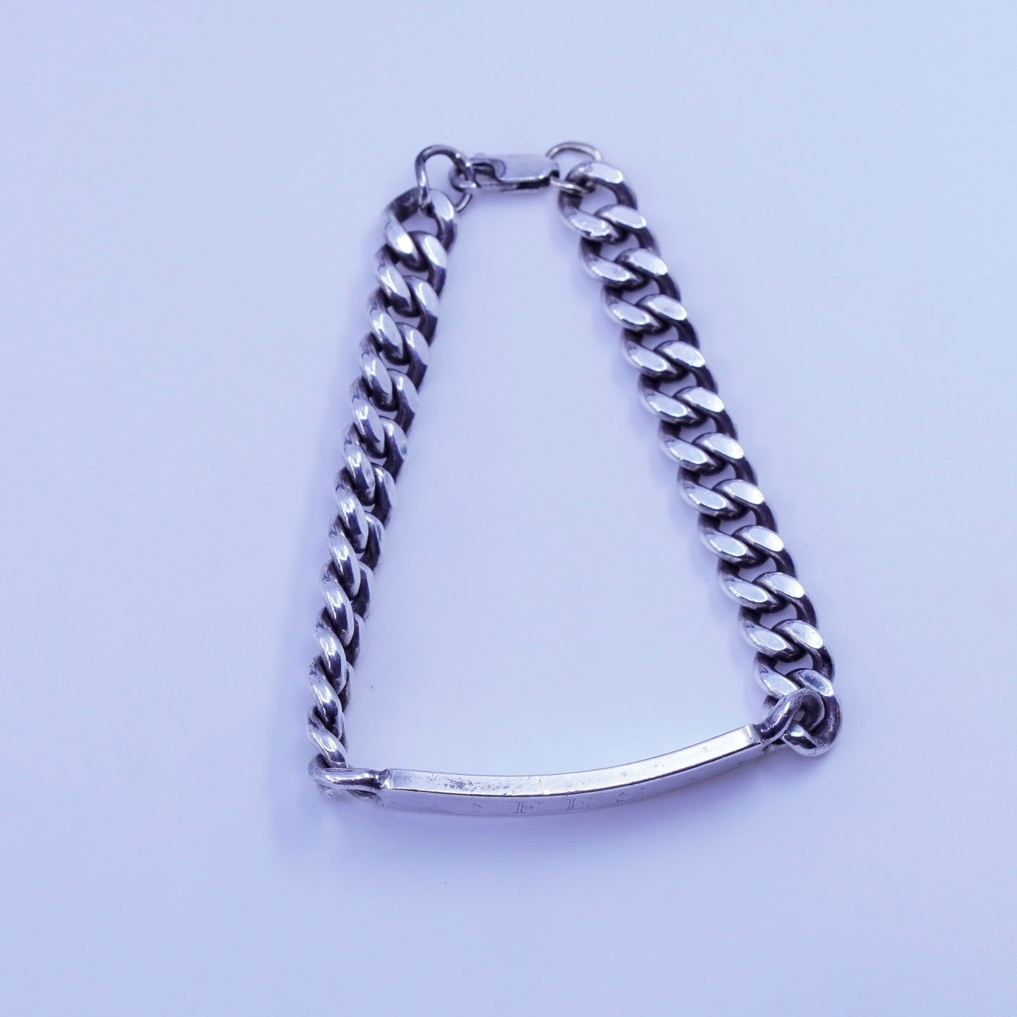 7.5”, doskow Sterling silver bracelet, 925 curb chain name tag engraved “FES”