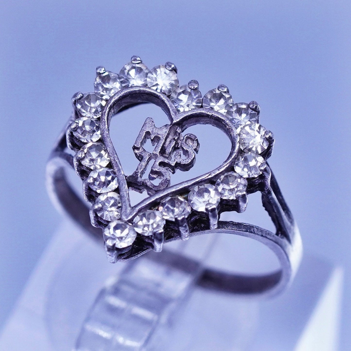 Size 7.5, vintage Avon Sterling 925 silver engagement ring with Cz and “mis 15”
