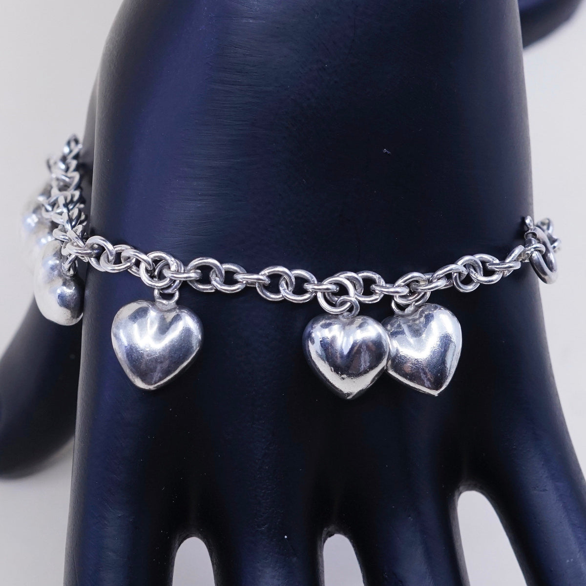 7.75”, 3mm, vtg JCM sterling 925 silver circle bracelet w/ cluster heart charms