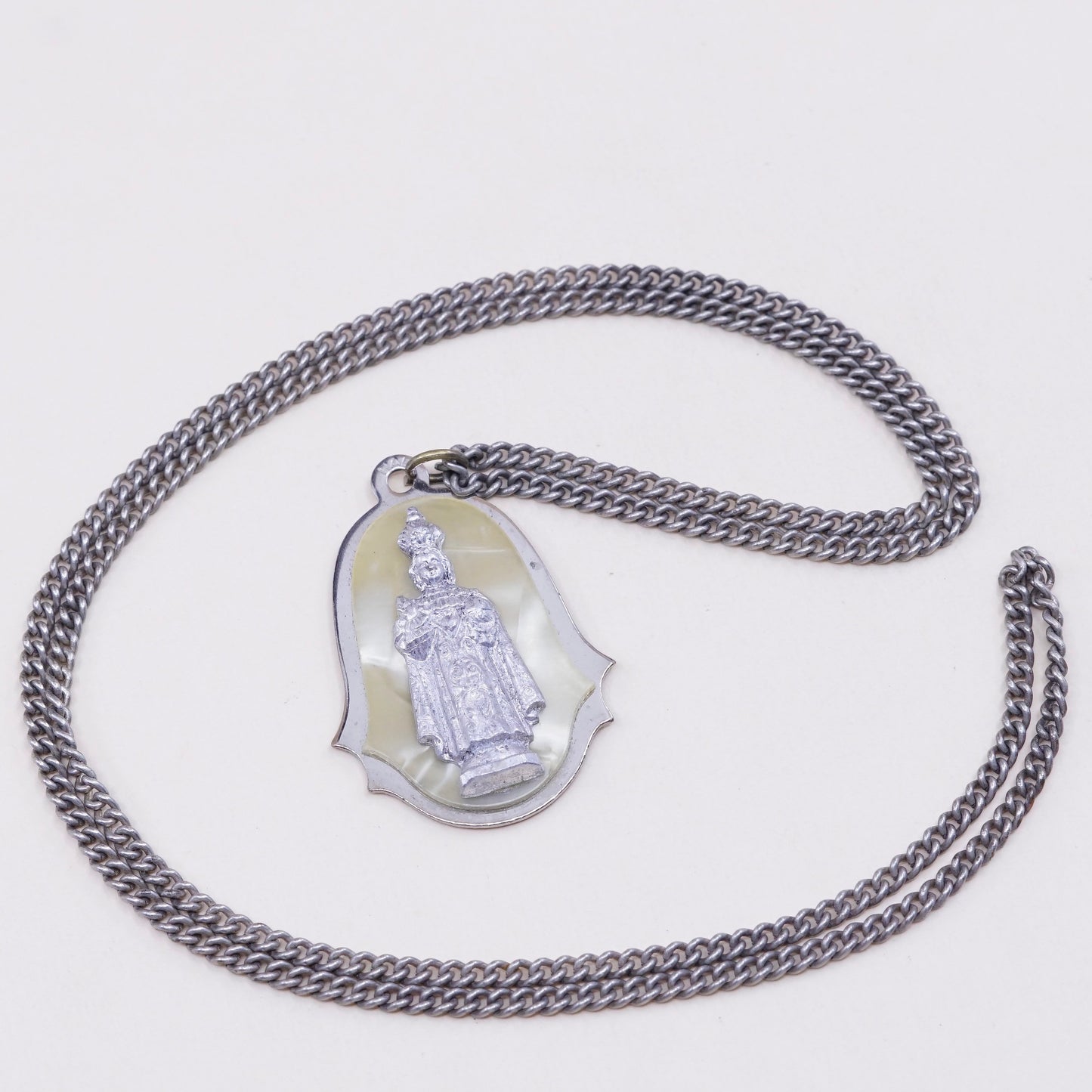24”, vintage silver tone necklace with “queen” pendant