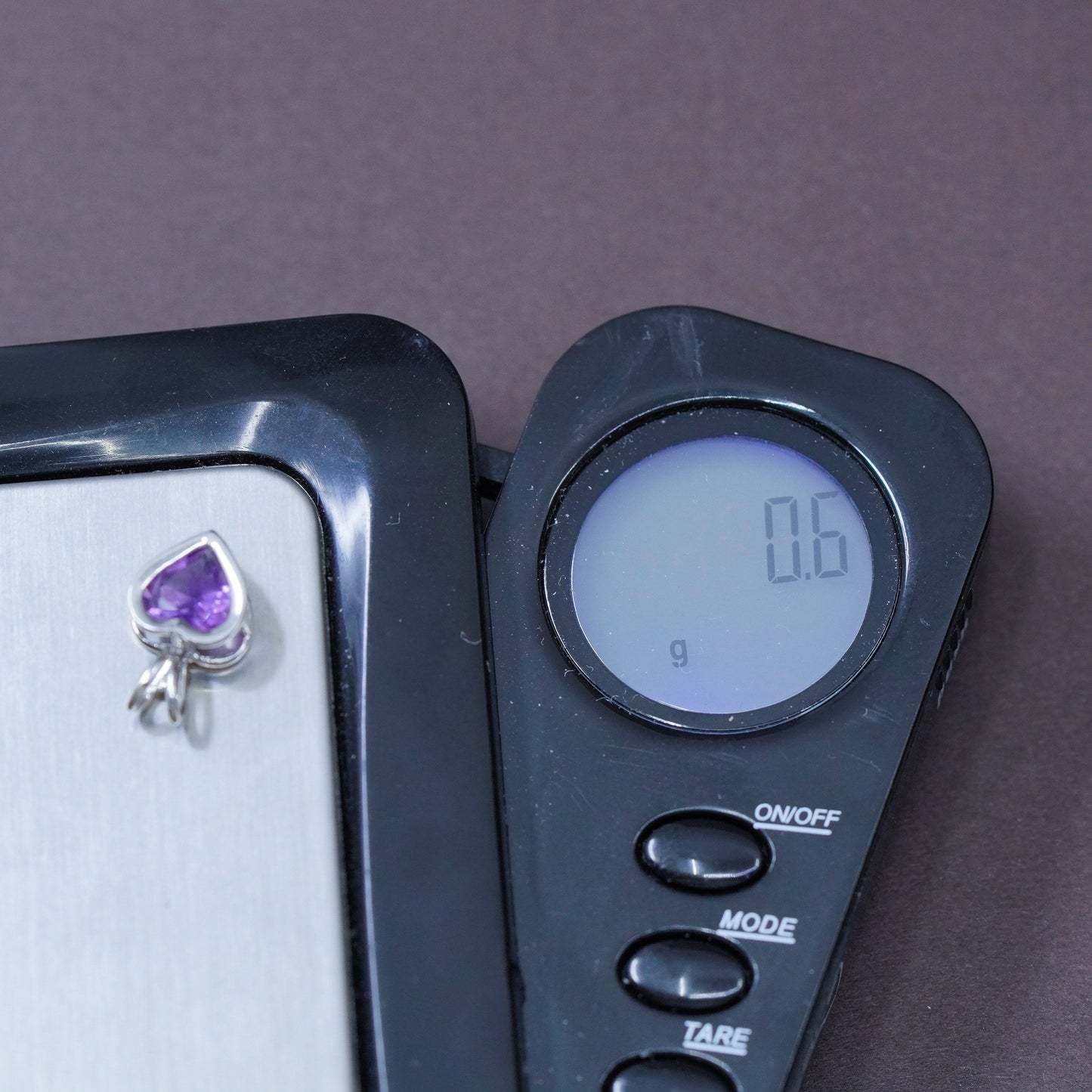 0.6g, Carla 14K white gold heart pendant with amethyst, stamped Carla 14K