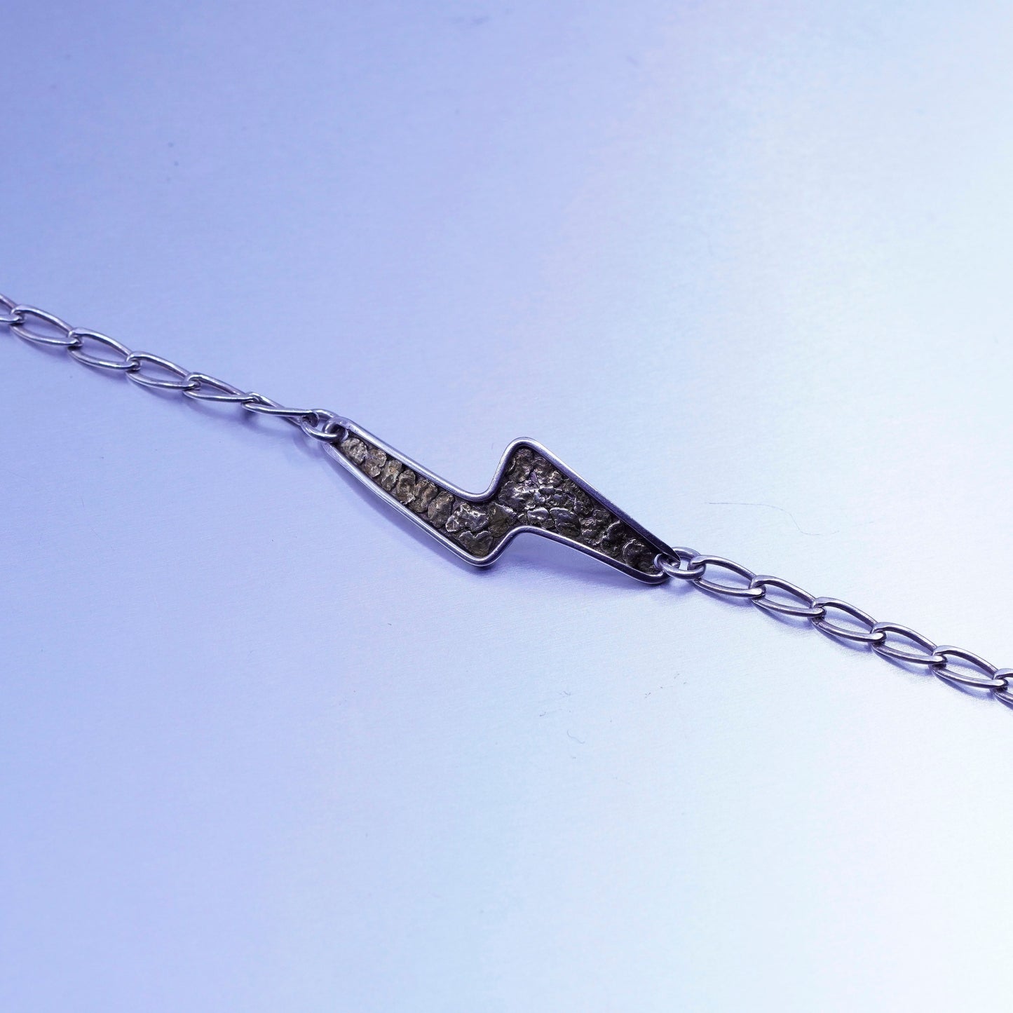 7.25”, Sterling 925 silver bracelet, oval chain with 14K gold lightening charm