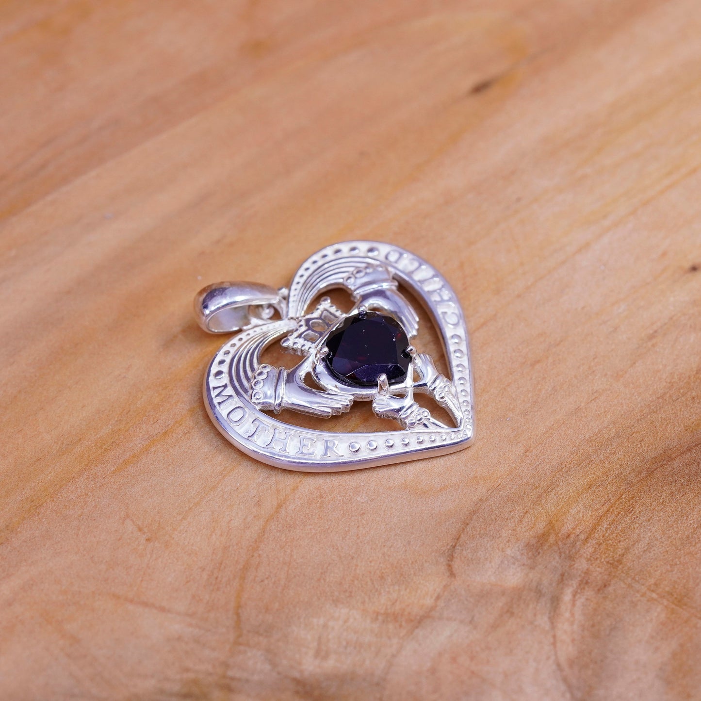 Vintage Ireland sterling silver claddagh pendant, holding heart 925 charm ruby