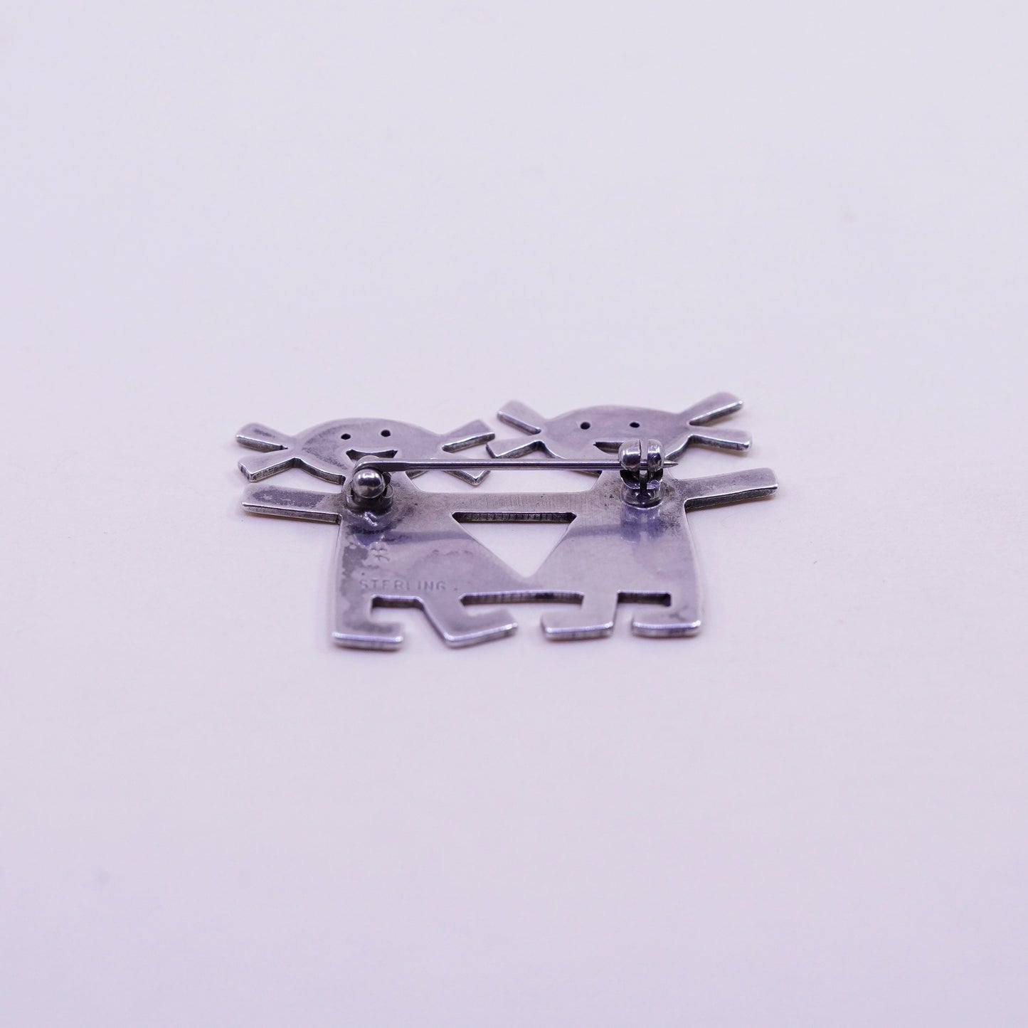 Vintage sterling 925 silver handmade brooch, two girls holding hands