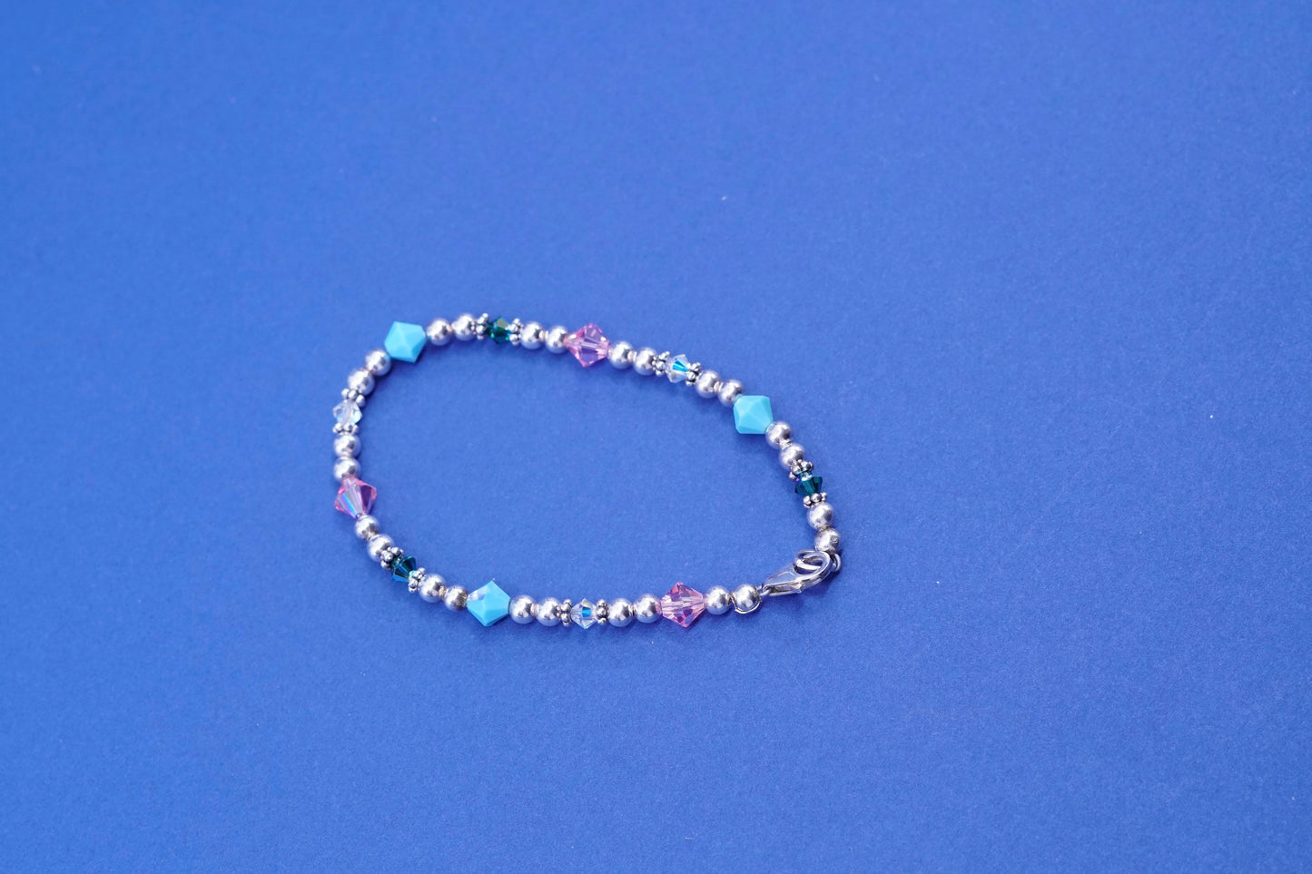 6.75”, sterling 925 silver handmade bracelet with turquoise pink crystal beads