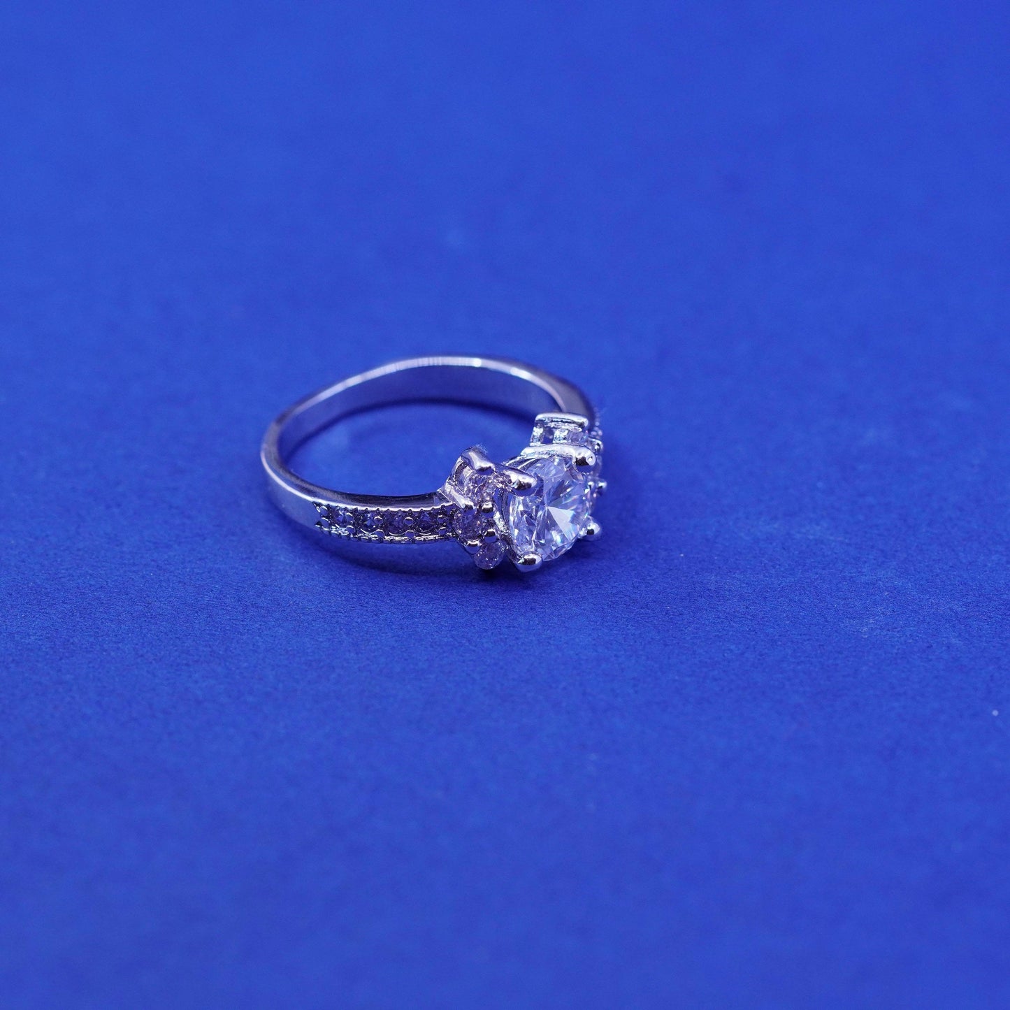 Size 9.25, vintage Sterling 925 silver engagement ring with clear cz stones