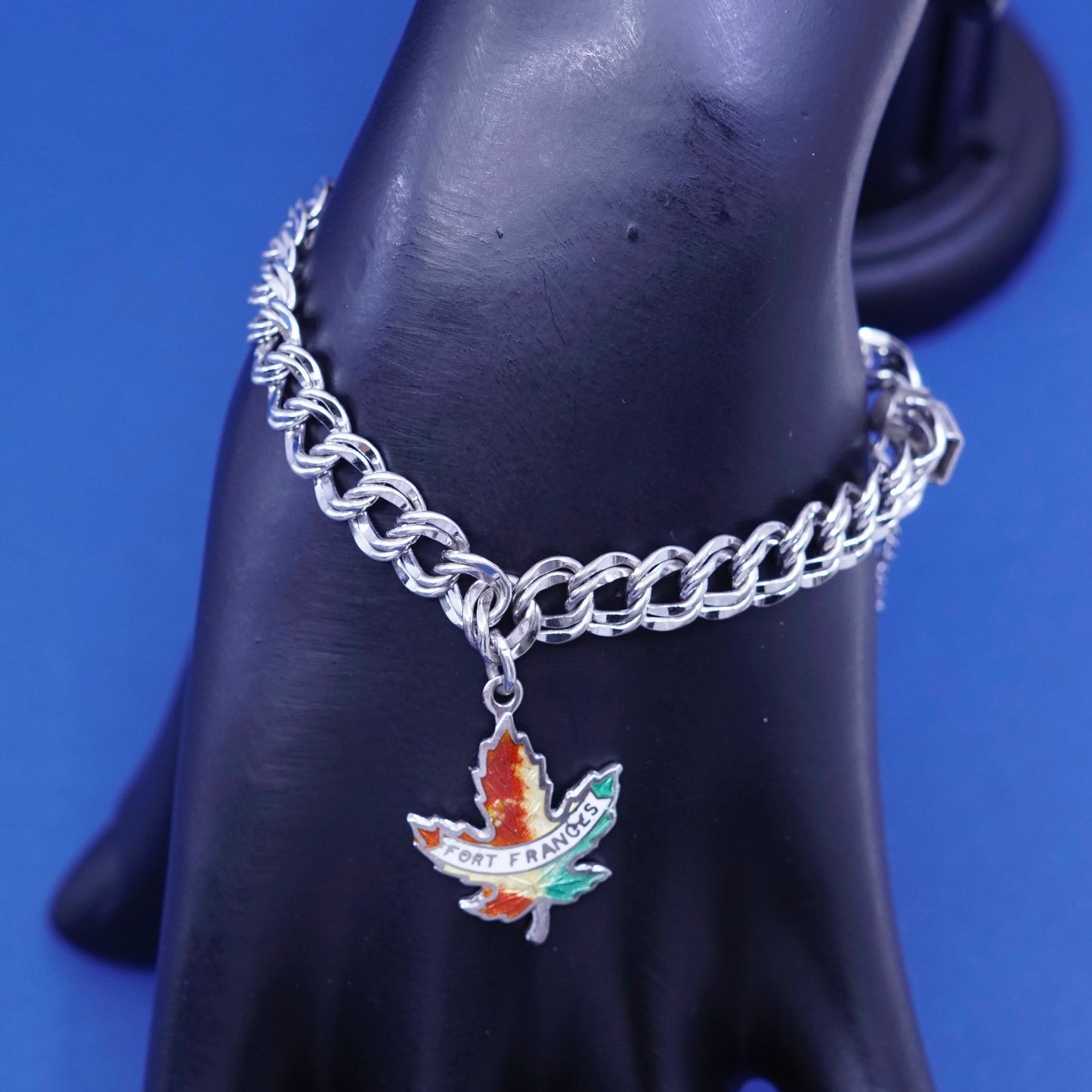 6.25”, Sterling silver bracelet, 925 double curb chain w/ Canada maple charm