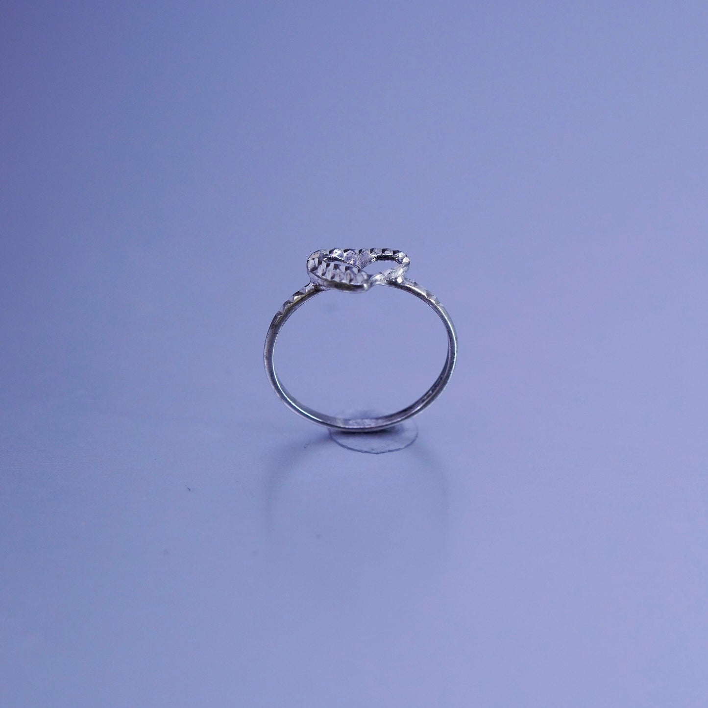 Size 4.5, southwestern Sterling 925 silver wedding ring, heart stackable band