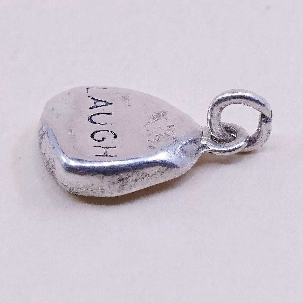 Vintage DV sterling silver Nugget charm, 925 pendant with “laugh” embossed