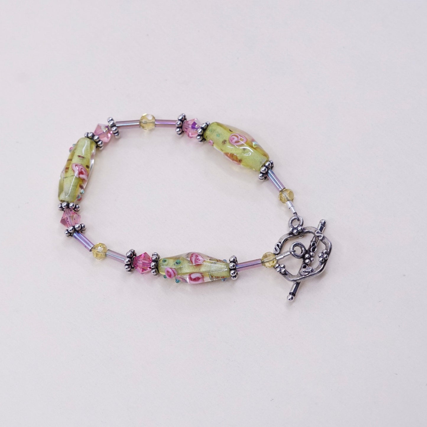 6.5”, vintage handmade bracelet with artisan glass and toggle closure