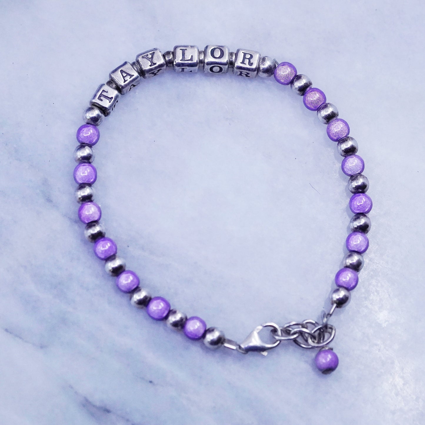 6.5”, Sterling silver handmade name “Taylor” cube bracelet purple crystal beads