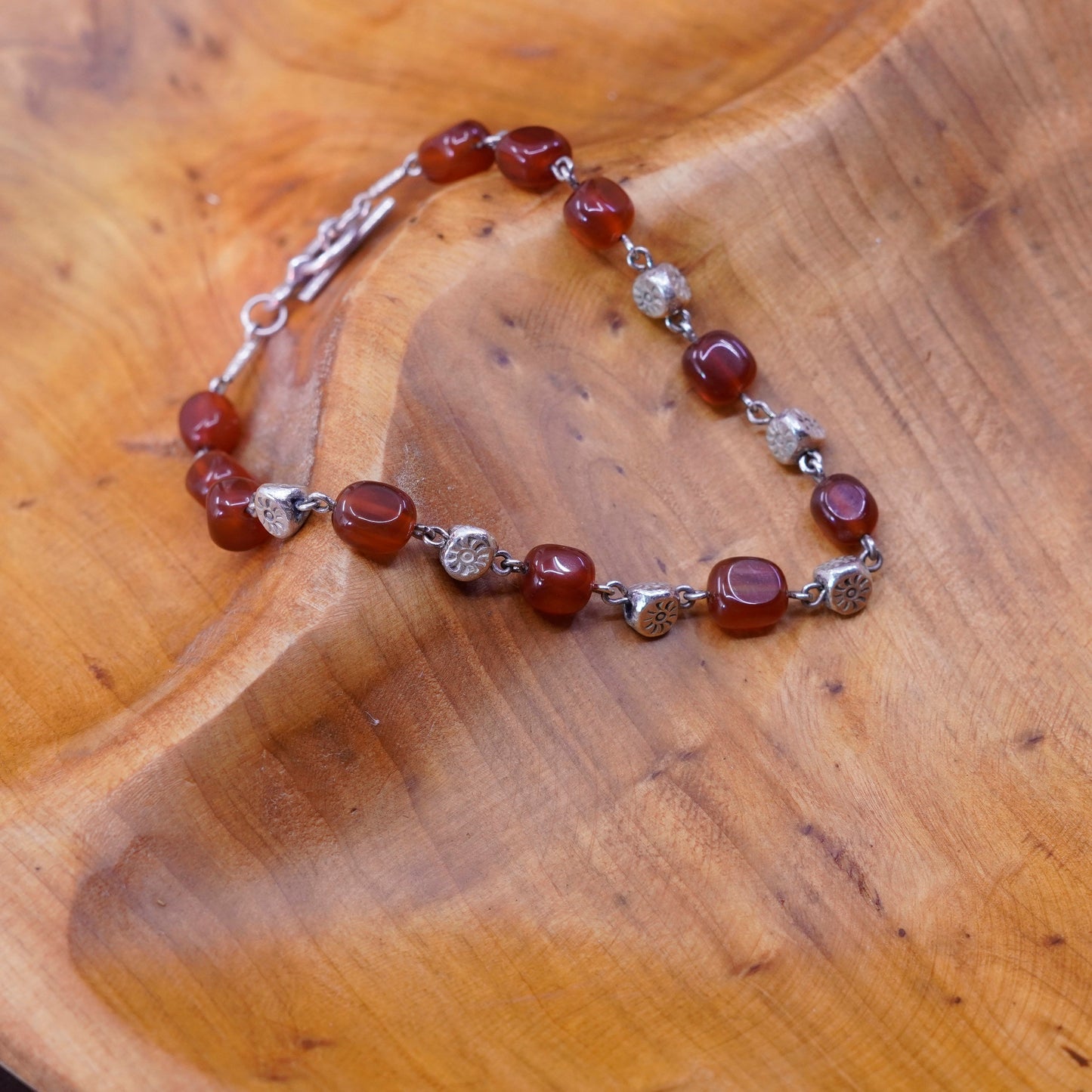 7.75”, vtg Sterling silver handmade garnet beads bracelet with toggle closure